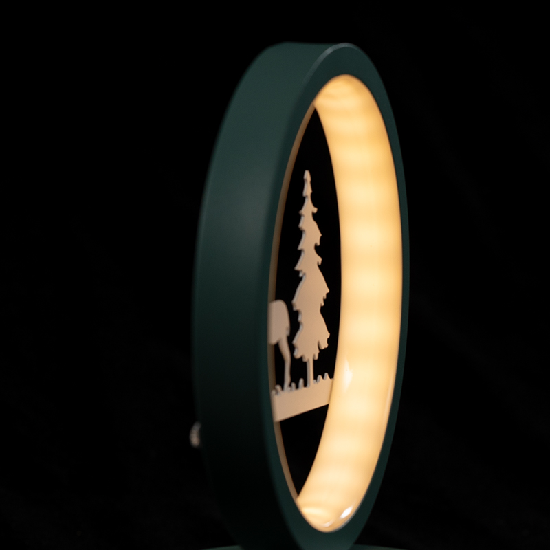 Table light with deer and tree pattern