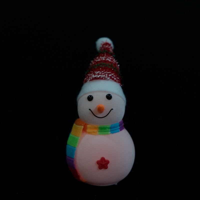 White flannel snowman with rainbow hat
