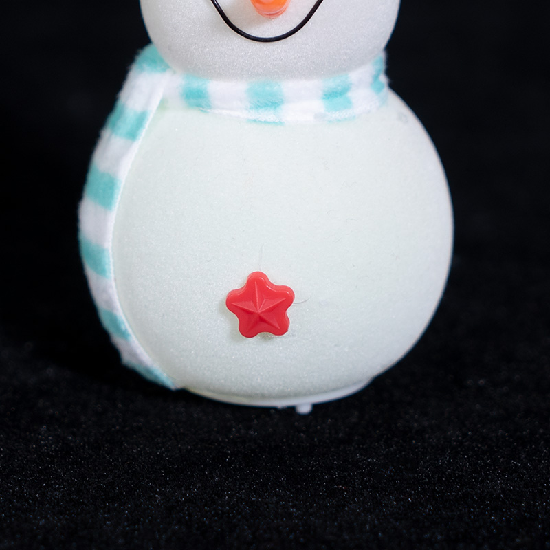 White flannel snowman with red hat