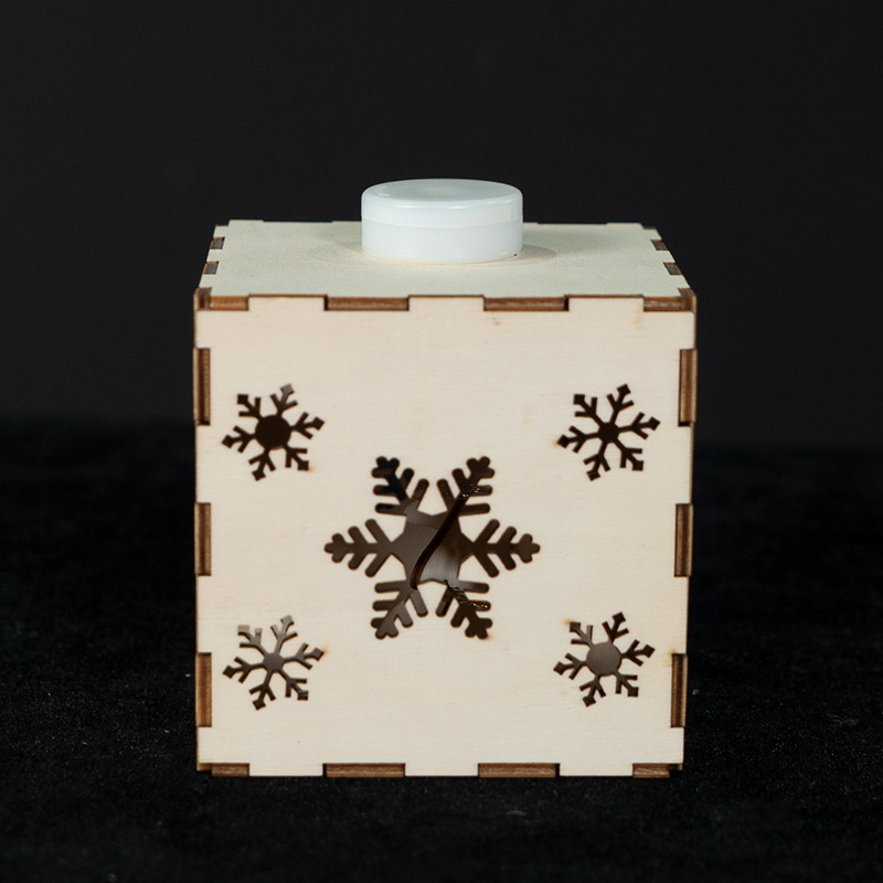 Wood box with snowflake pattern